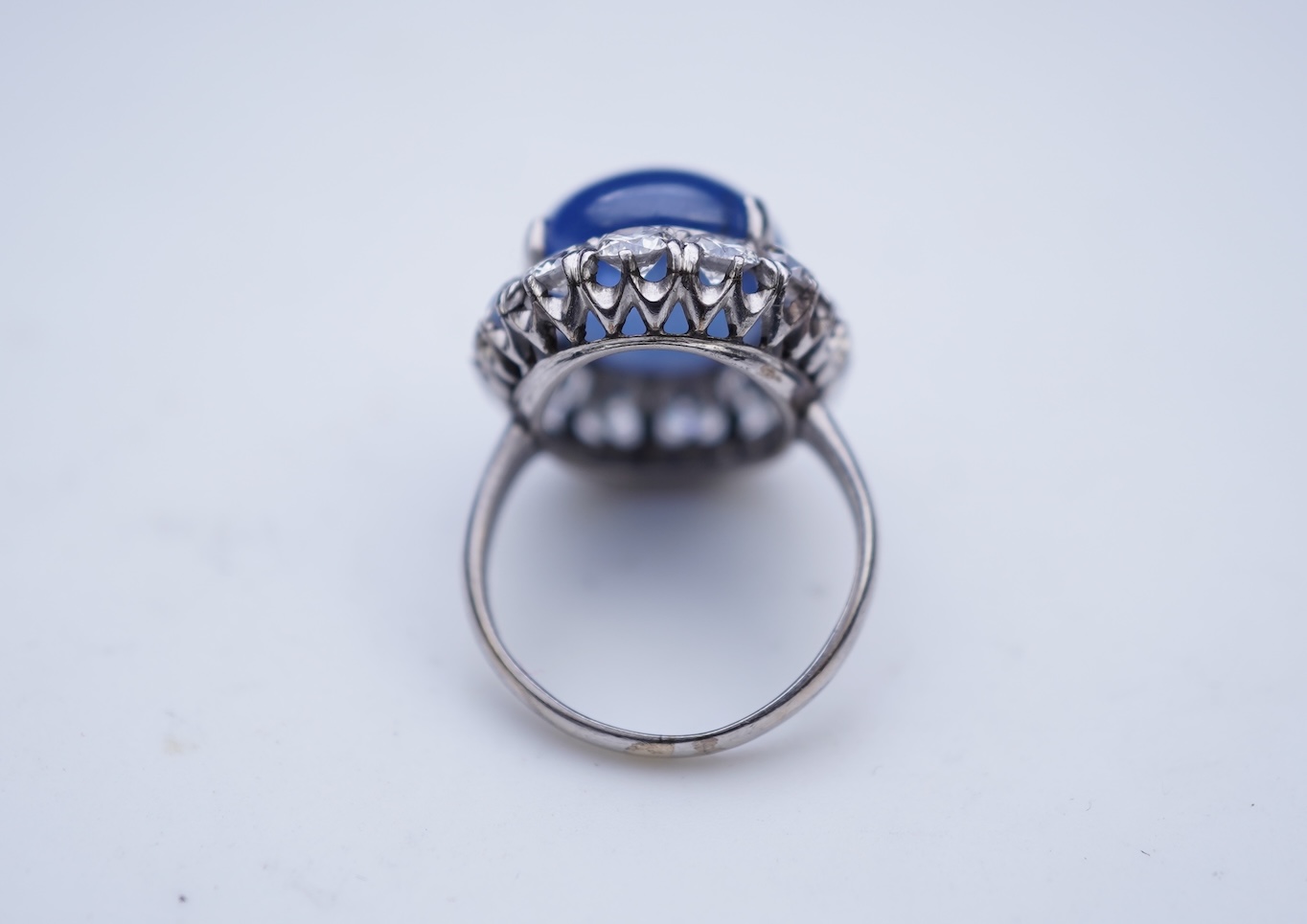 A sapphire and diamond ring, mid 20th century